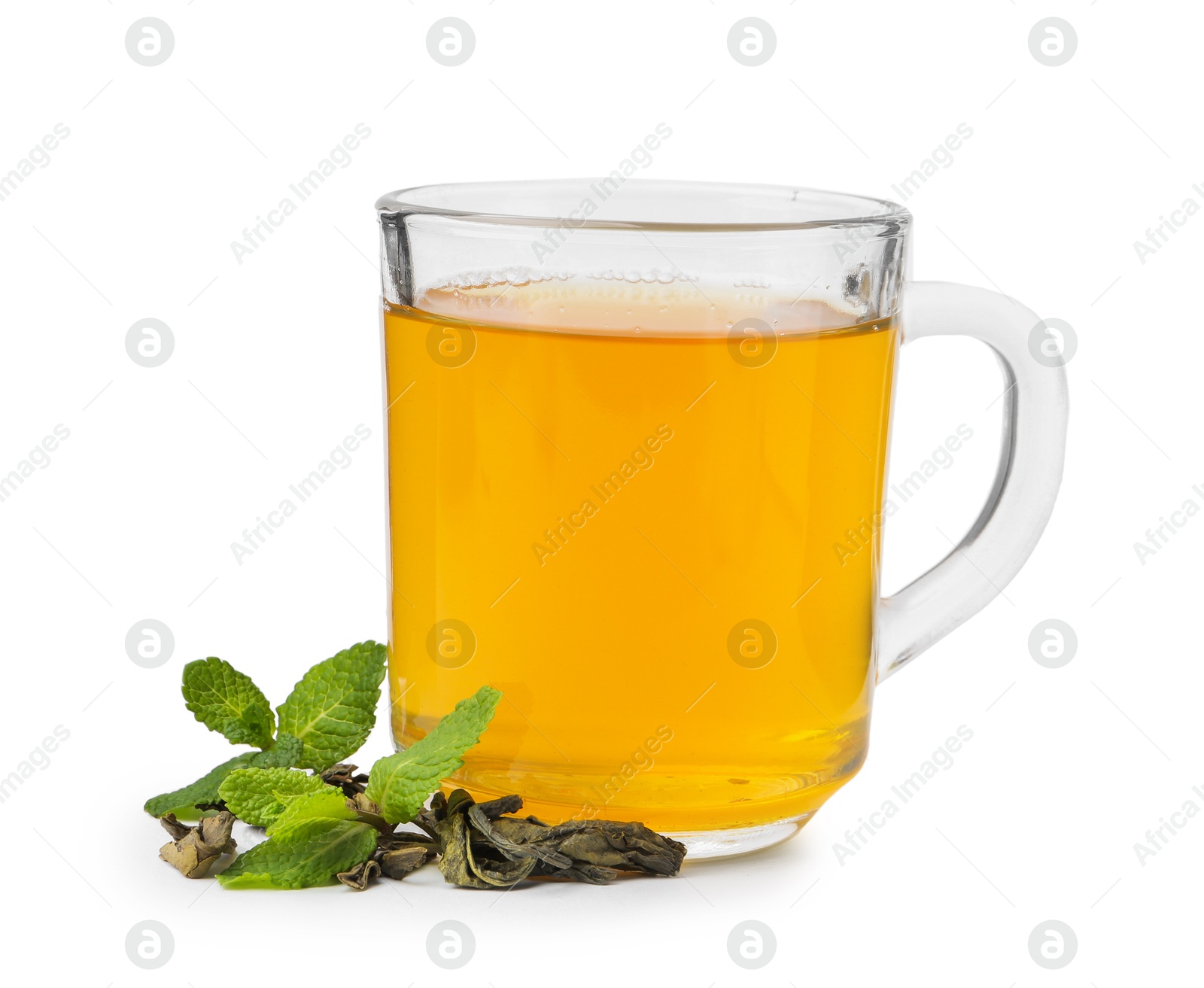 Photo of Aromatic mint tea, fresh and dried leaves isolated on white