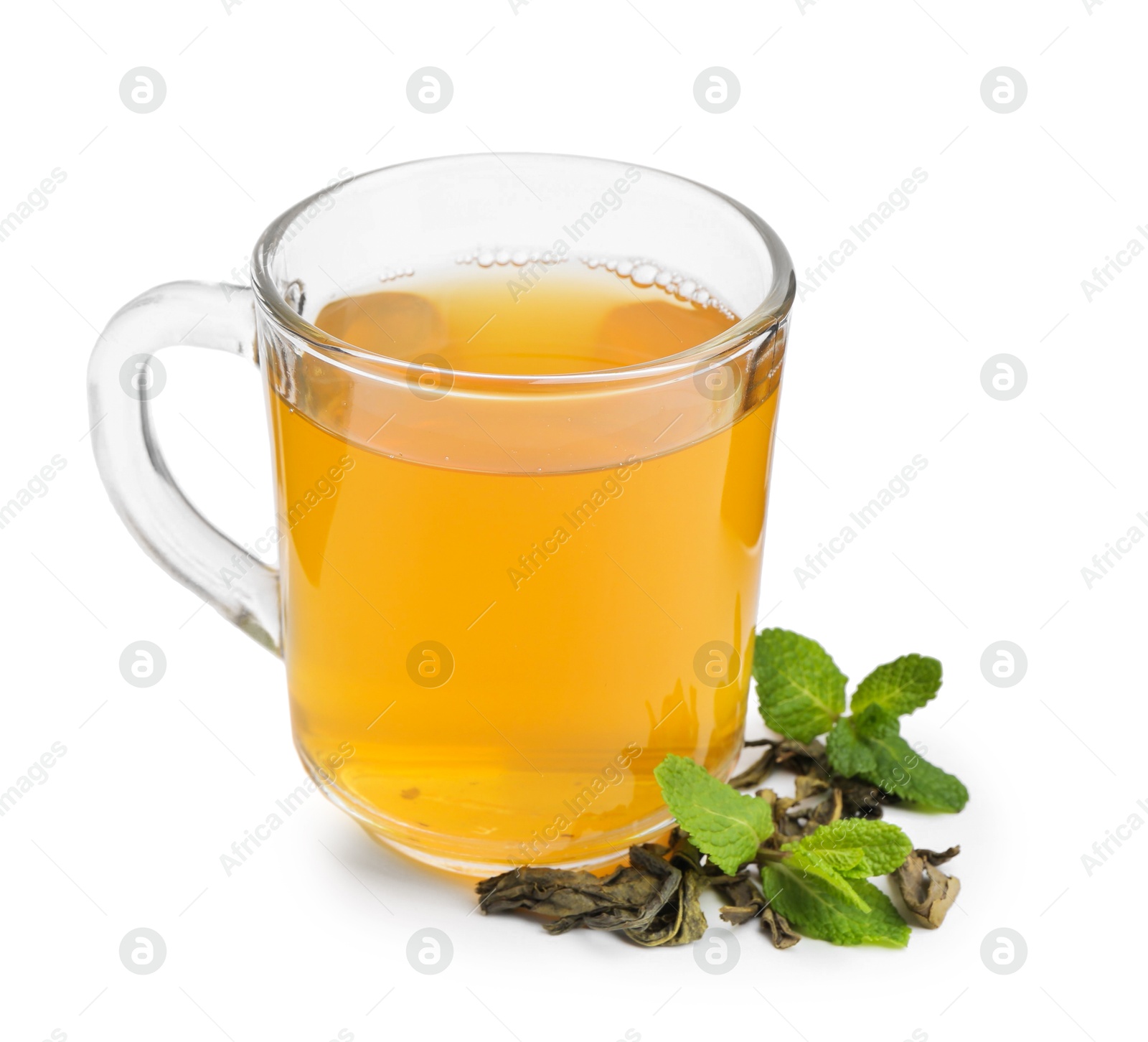 Photo of Aromatic mint tea, fresh and dried leaves isolated on white