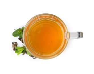 Photo of Aromatic mint tea, fresh and dried leaves isolated on white