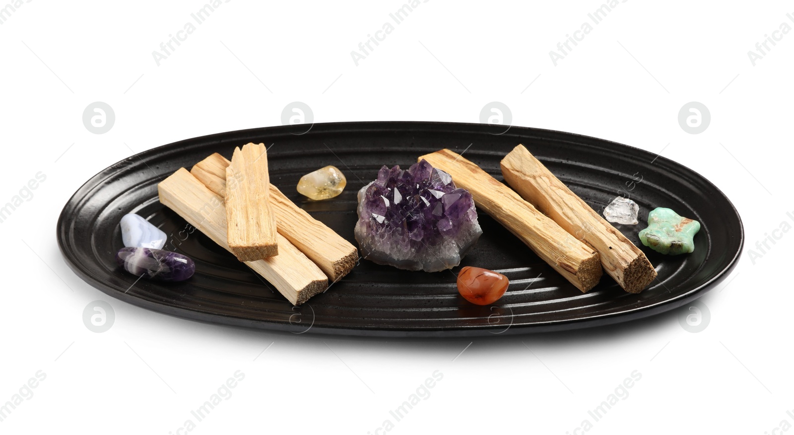 Photo of Palo santo sticks and gemstones isolated on white