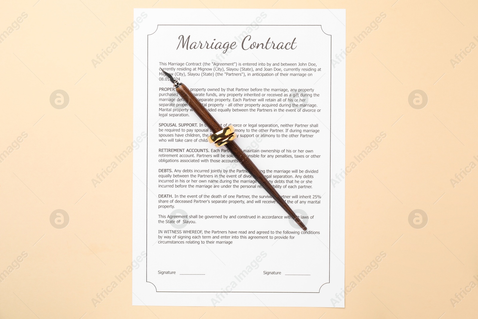 Photo of Marriage contract, pen and golden rings on beige background, top view