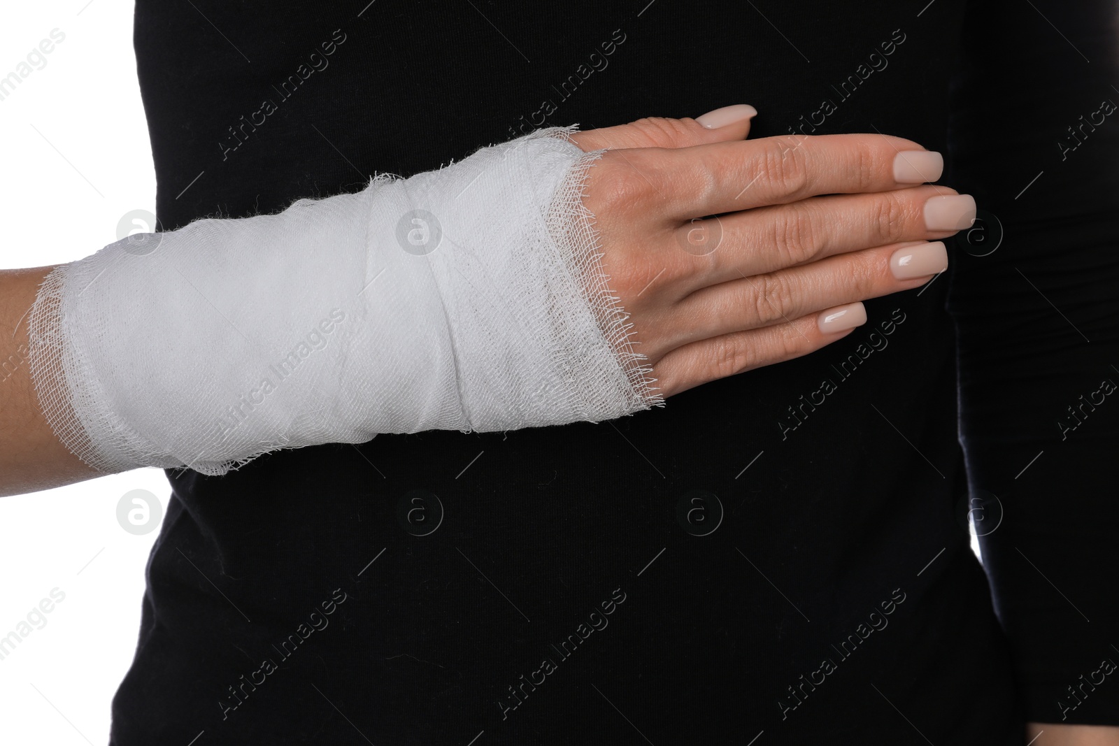 Photo of Woman with medical bandage on wrist against white background, closeup