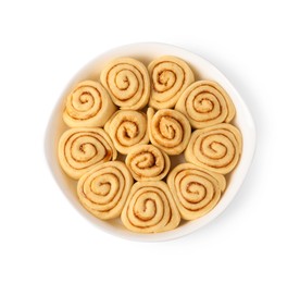 Photo of Raw cinnamon rolls in baking dish isolated on white, top view