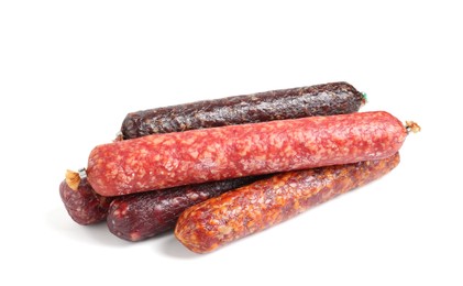 Photo of Many different dry cured sausages isolated on white