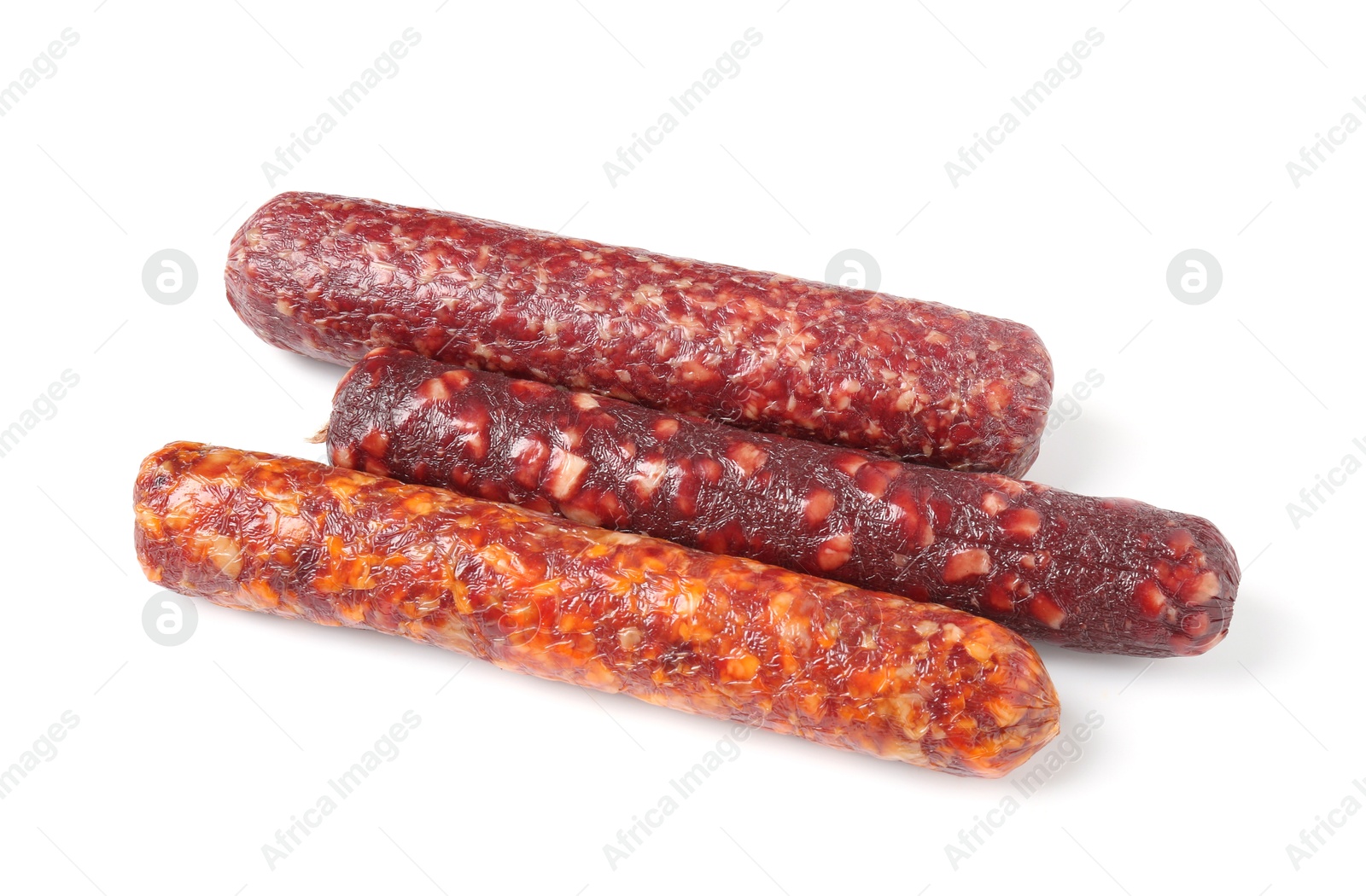 Photo of Many different dry cured sausages isolated on white