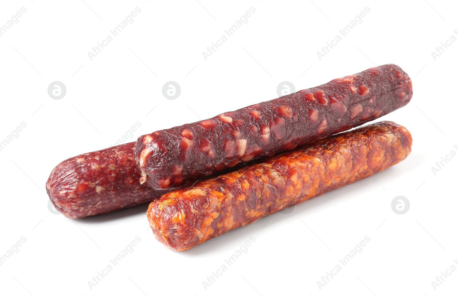 Photo of Many different dry cured sausages isolated on white