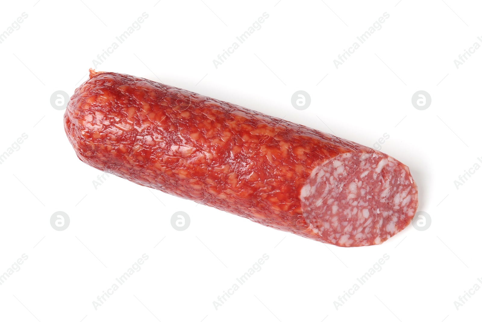 Photo of Piece of delicious smoked sausage isolated on white, top view