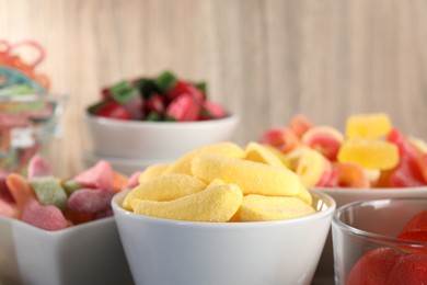 Photo of Candy bar. Many different sweets on wooden background, closeup