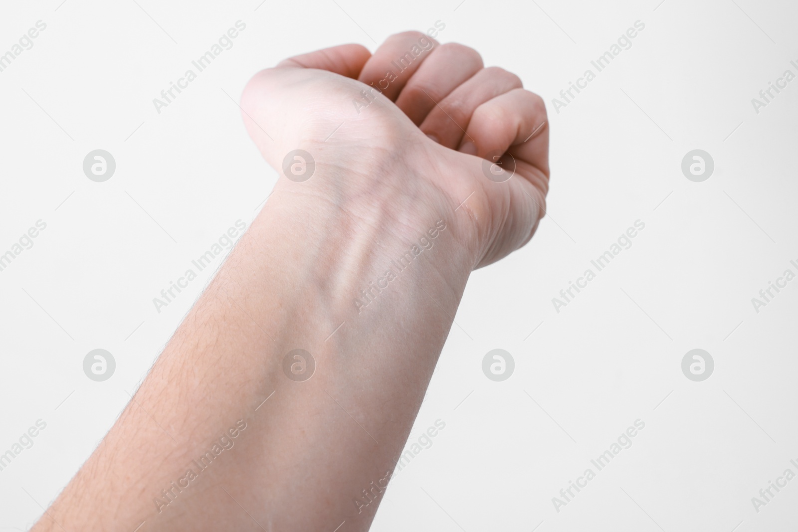 Photo of Woman with visible hand veins on white background, closeup