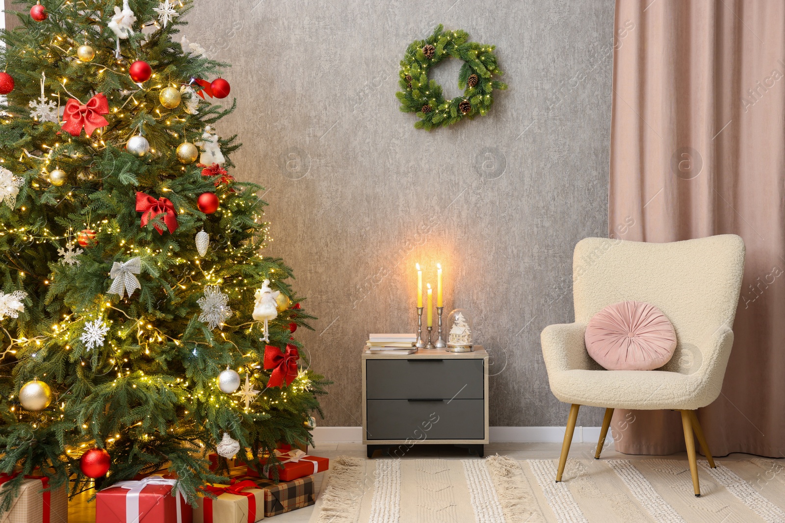 Photo of Cozy room with Christmas, cabinet and armchair. Interior design for holiday