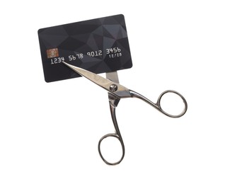 Photo of Credit card and scissors isolated on white