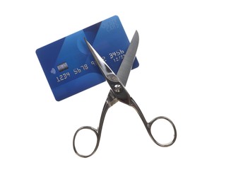 Photo of Credit card and scissors isolated on white