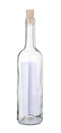 Photo of Corked glass bottle with rolled letter isolated on white