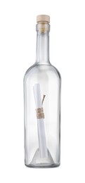 Photo of Corked glass bottle with rolled letter isolated on white