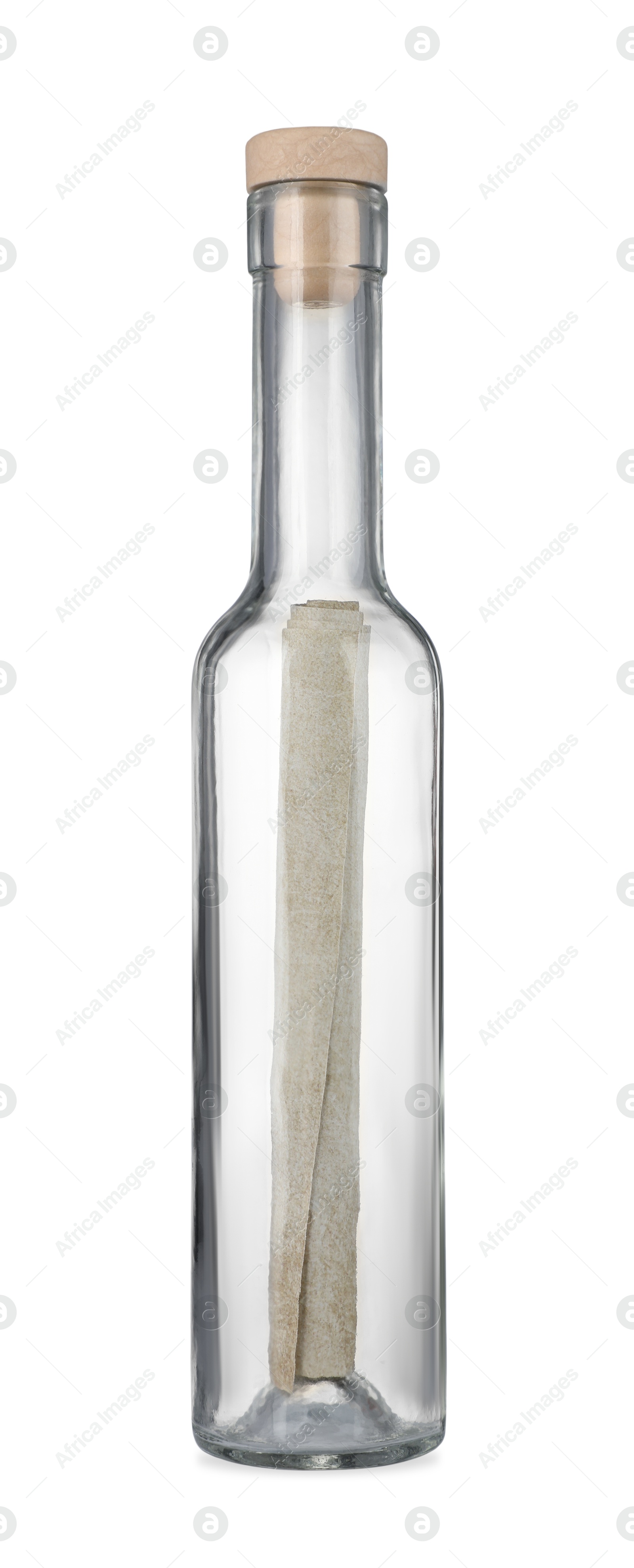 Photo of Corked glass bottle with rolled letter isolated on white