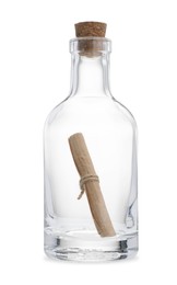 Photo of Corked glass bottle with rolled letter isolated on white