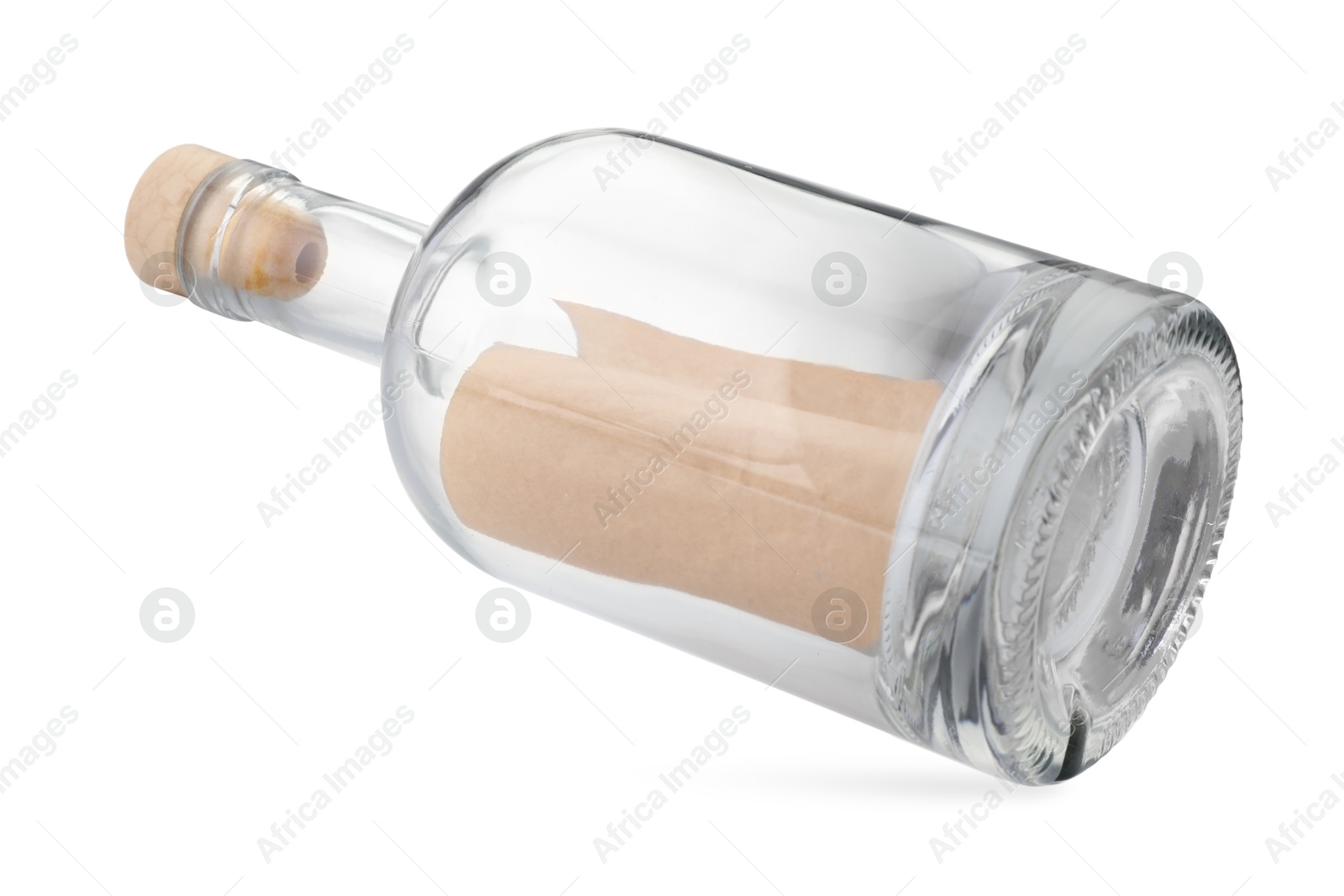 Photo of Corked glass bottle with rolled letter in air isolated on white