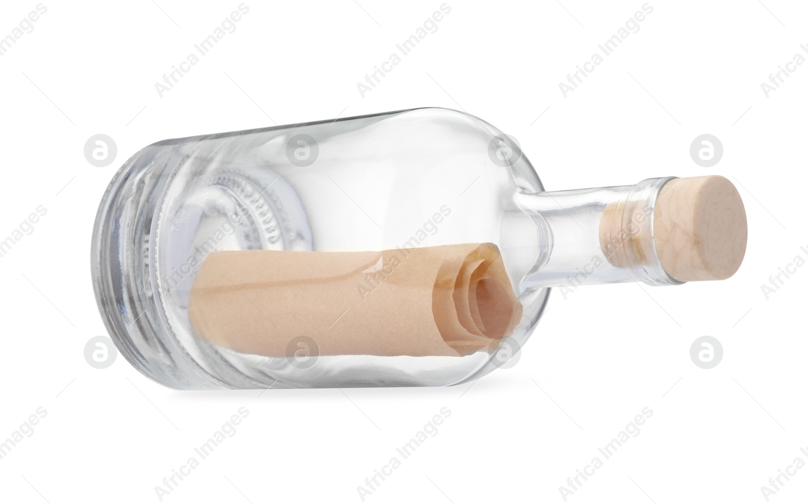 Photo of Corked glass bottle with rolled letter isolated on white