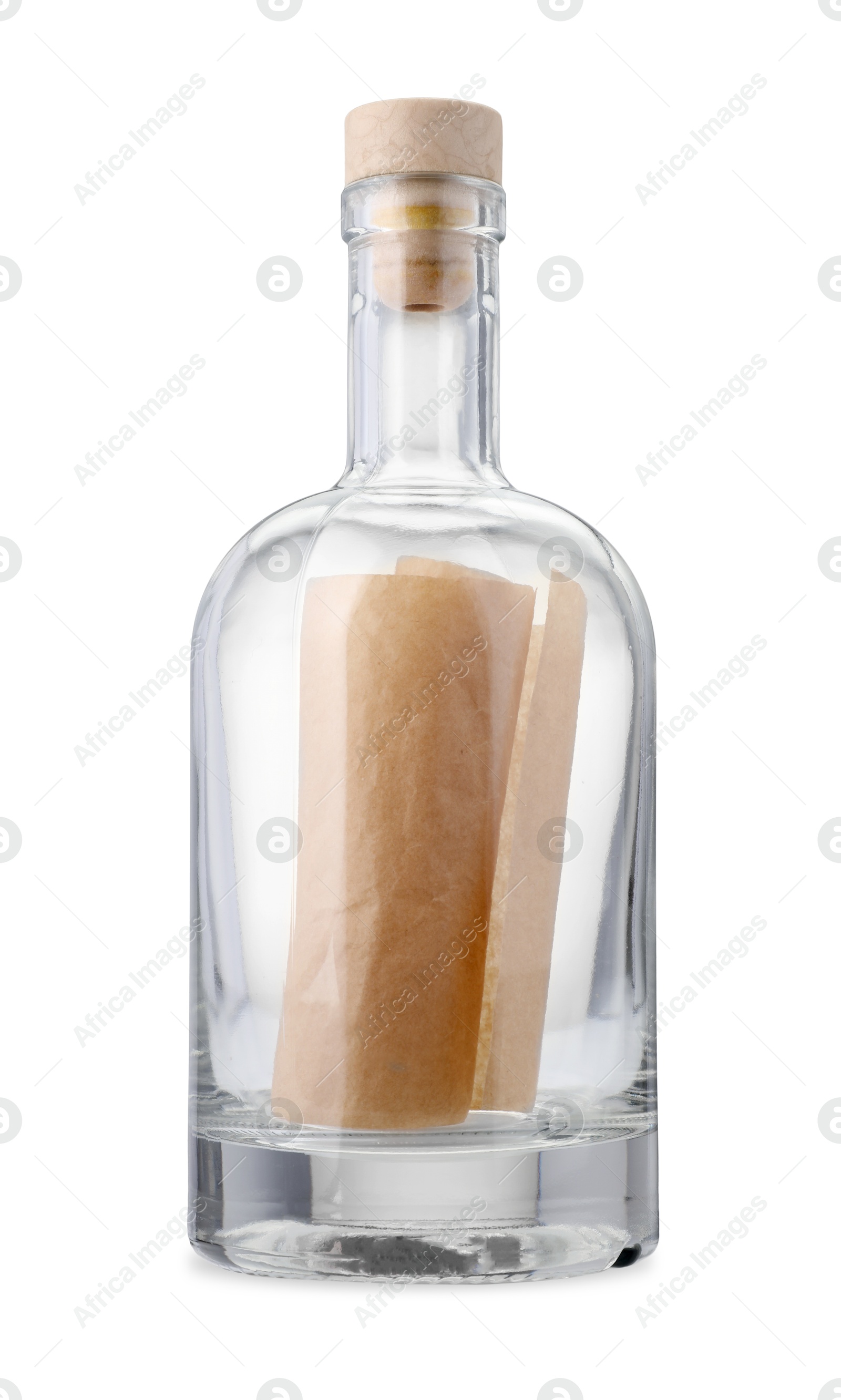 Photo of Corked glass bottle with rolled letter isolated on white