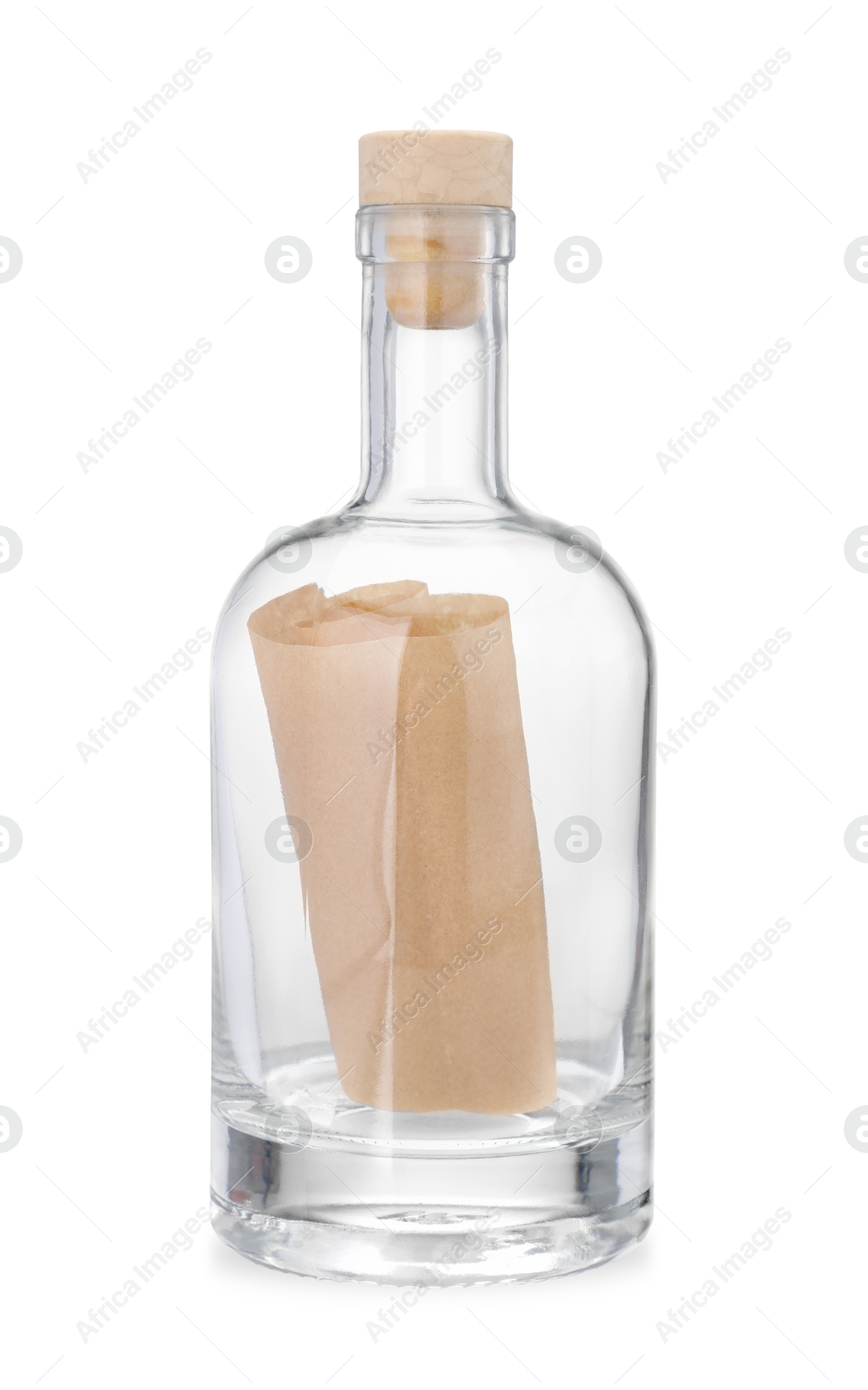 Photo of Corked glass bottle with rolled letter isolated on white