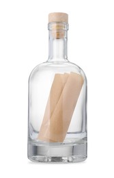 Photo of Corked glass bottle with rolled letter isolated on white