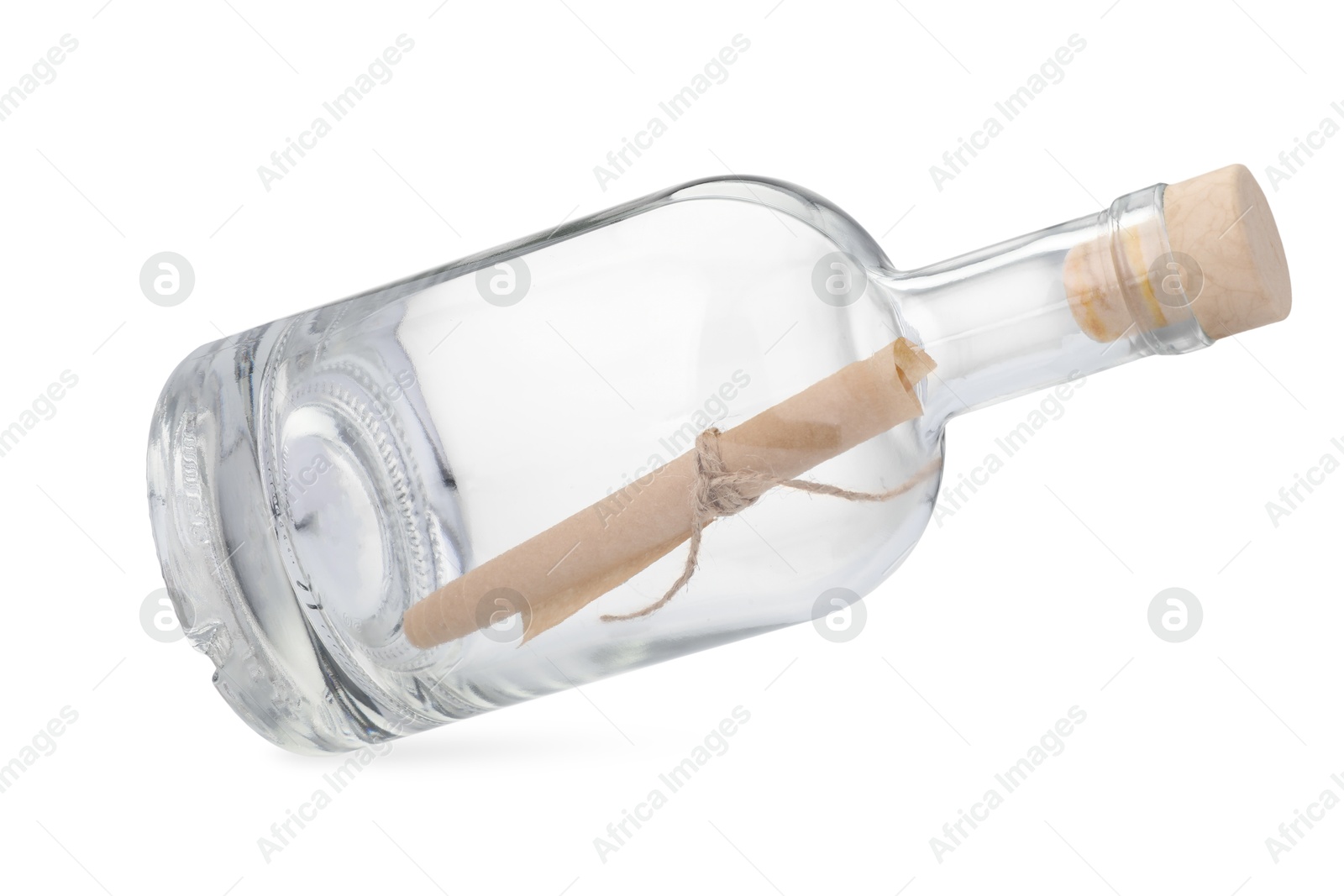 Photo of Corked glass bottle with rolled letter in air isolated on white