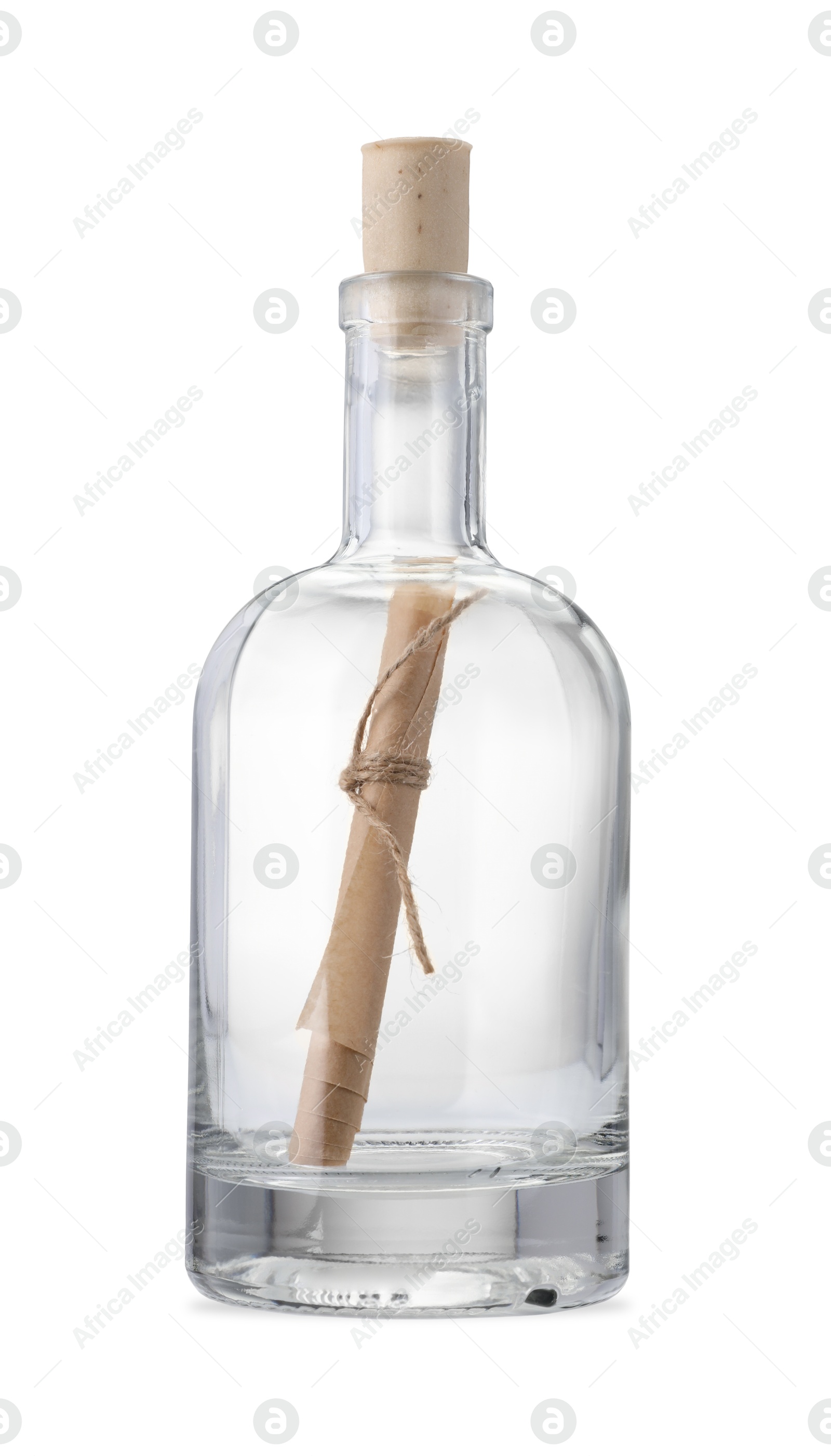 Photo of Corked glass bottle with rolled letter isolated on white