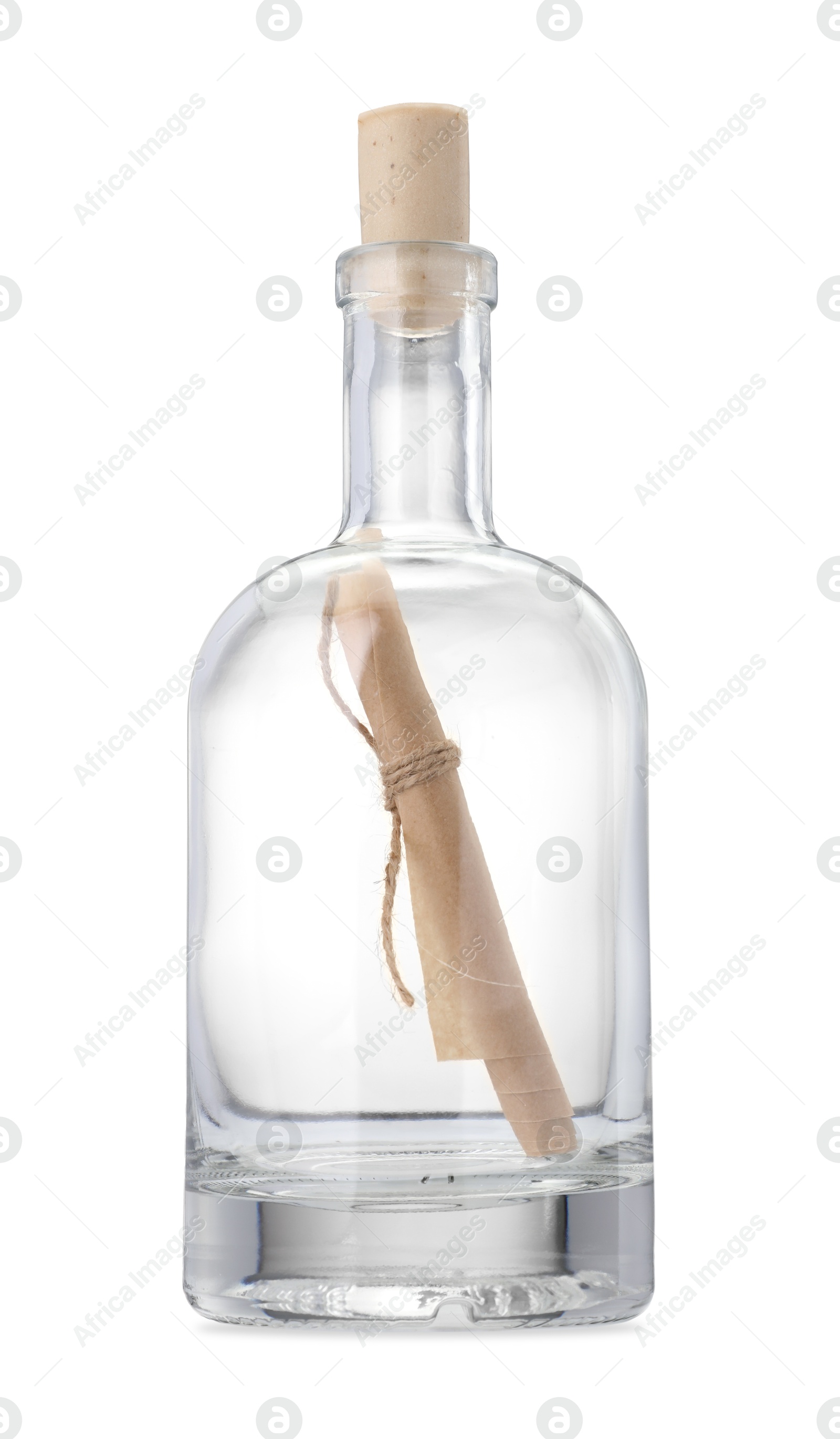 Photo of Corked glass bottle with rolled letter isolated on white