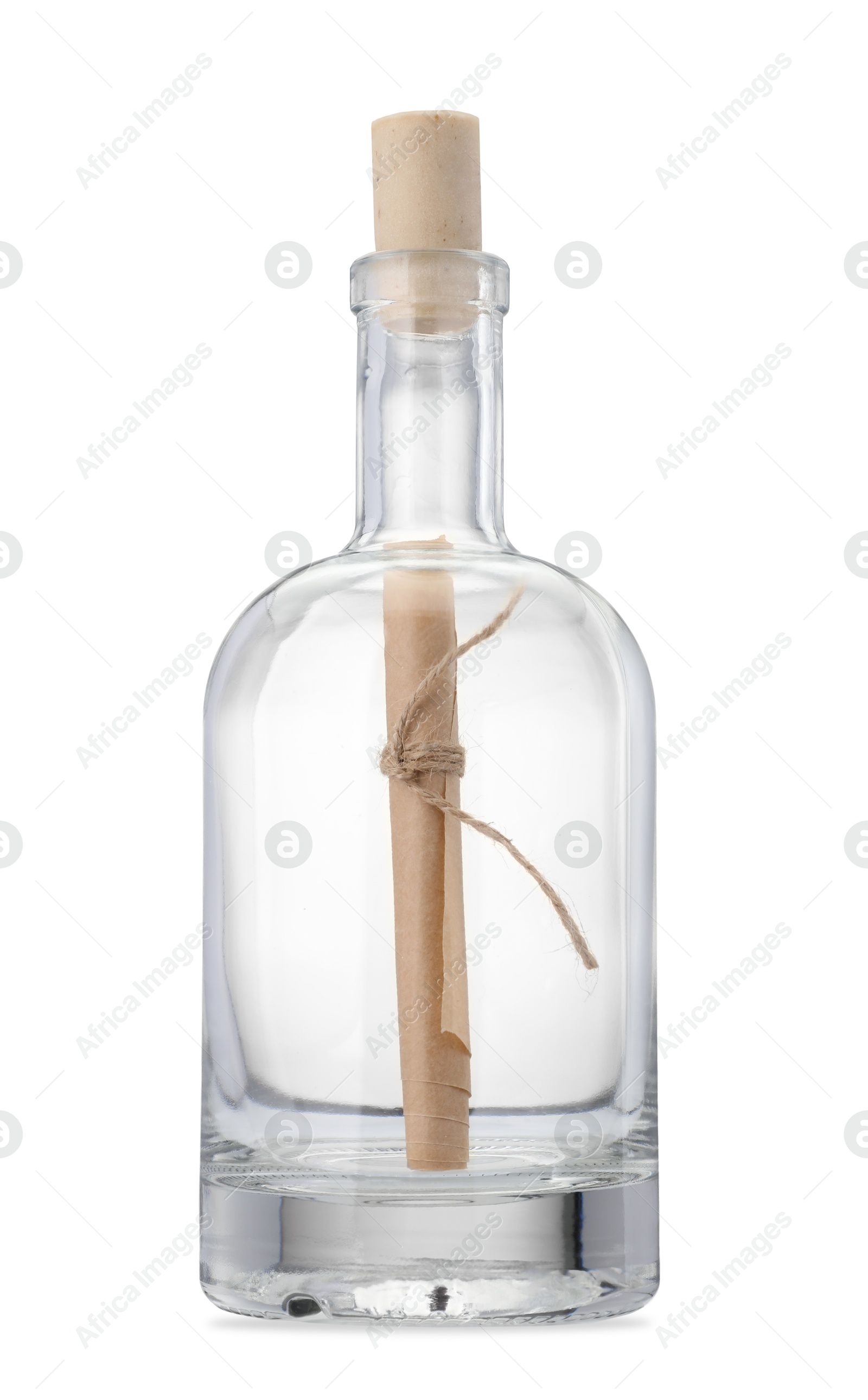 Photo of Corked glass bottle with rolled letter isolated on white