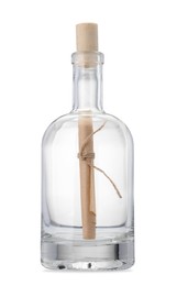 Photo of Corked glass bottle with rolled letter isolated on white