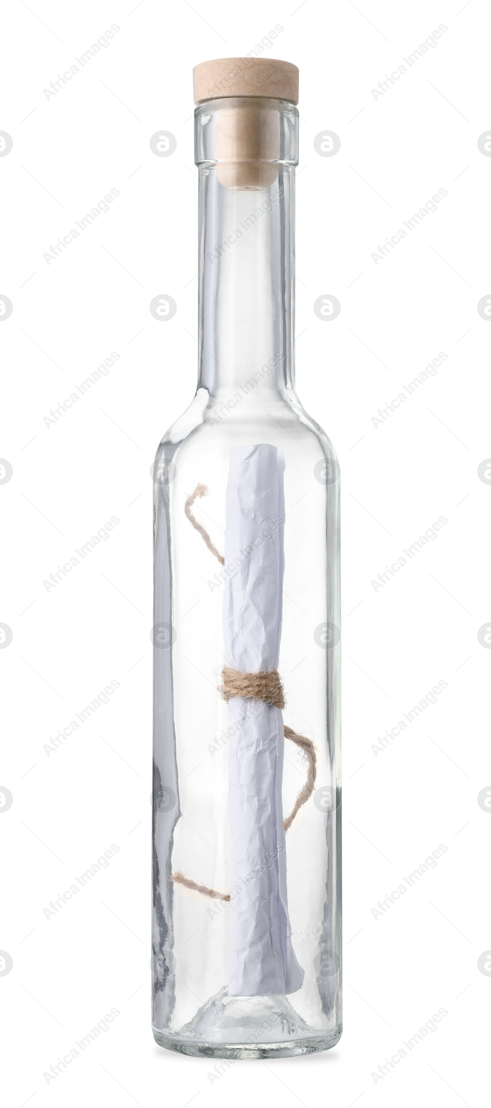 Photo of Corked glass bottle with rolled letter isolated on white