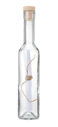 Photo of Corked glass bottle with rolled letter isolated on white