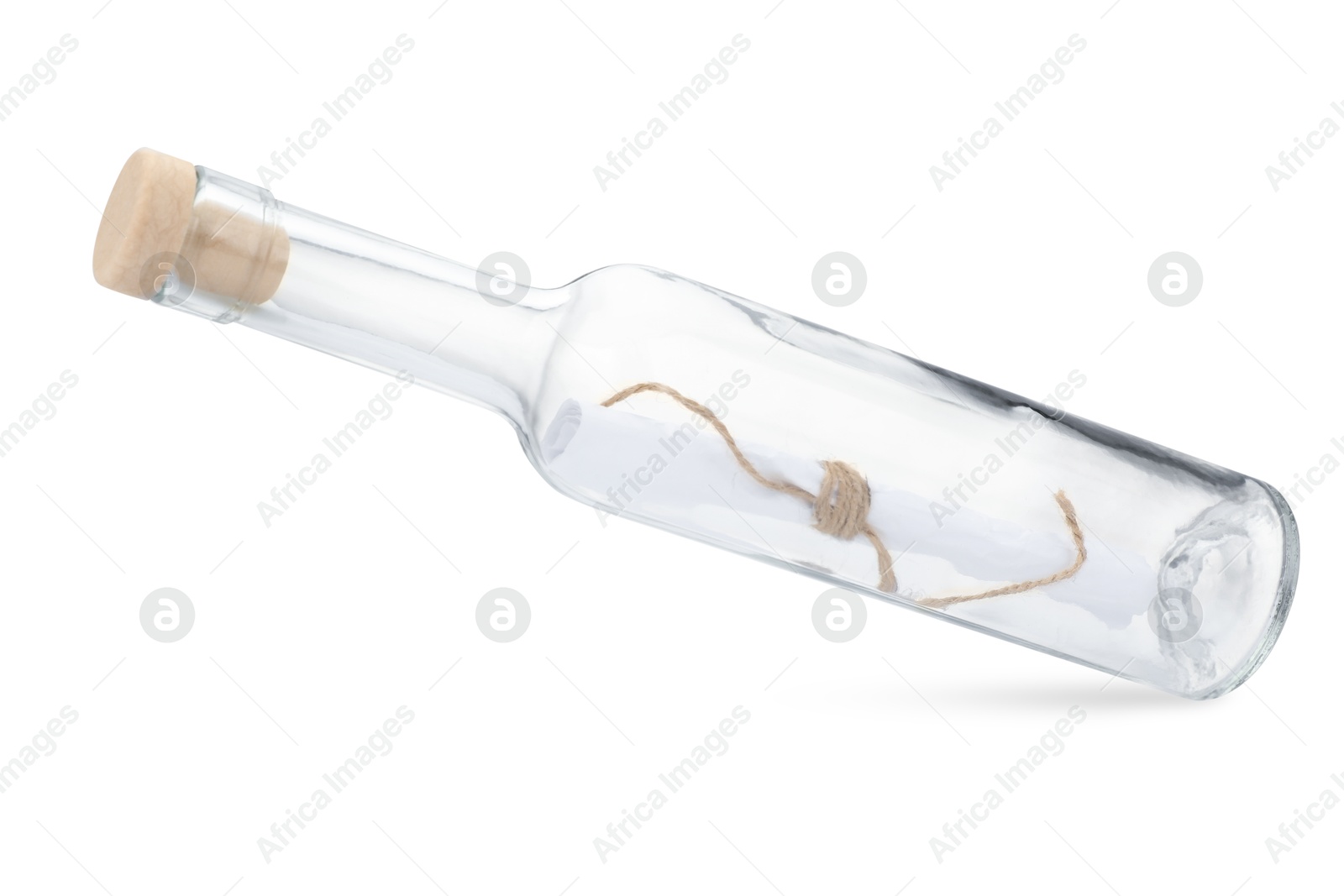 Photo of Corked glass bottle with rolled letter in air isolated on white