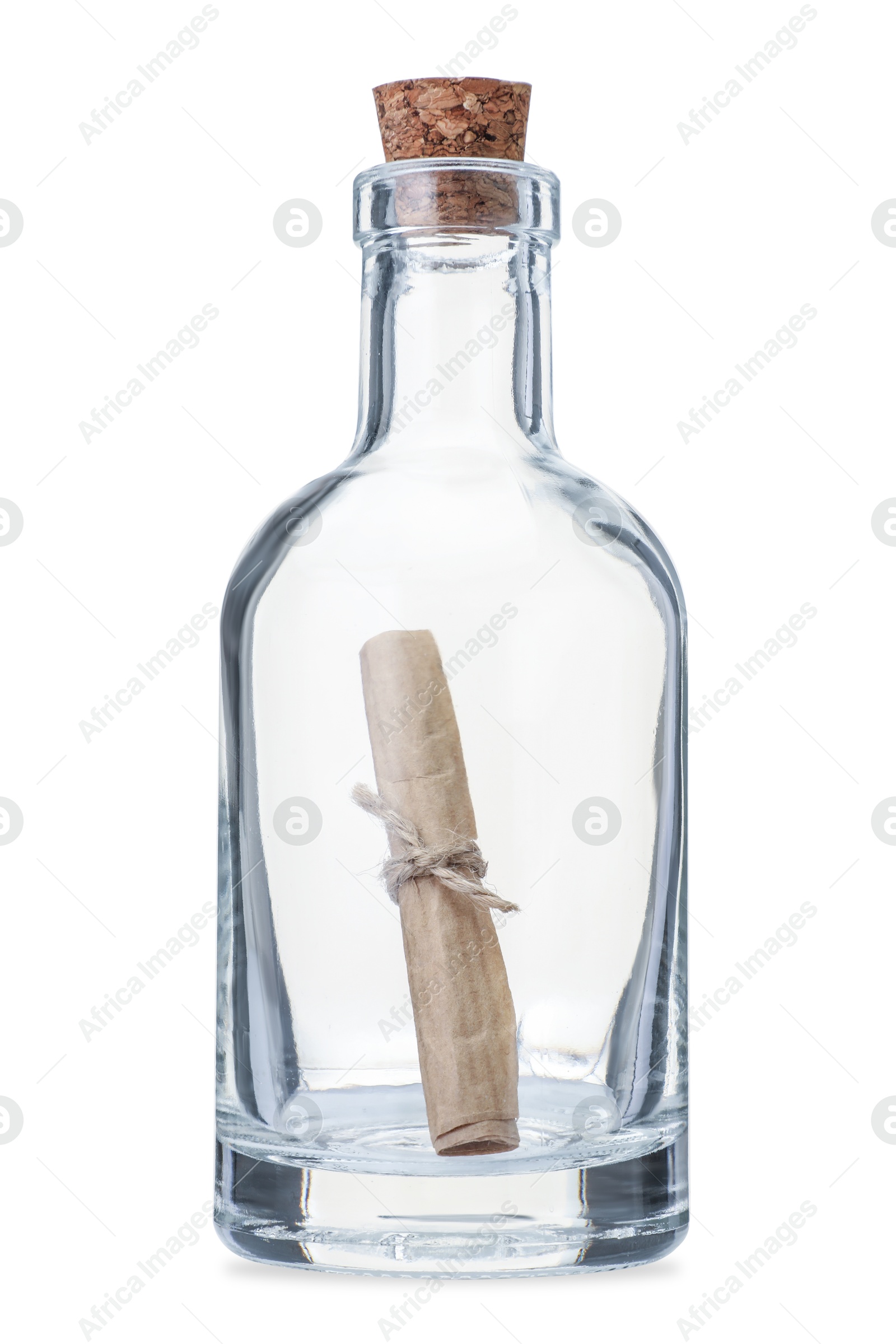 Photo of Corked glass bottle with rolled letter isolated on white