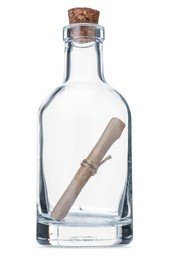 Photo of Corked glass bottle with rolled letter isolated on white