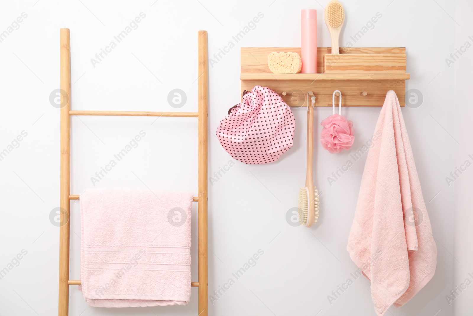 Photo of Shower cap and bath accessories in bathroom