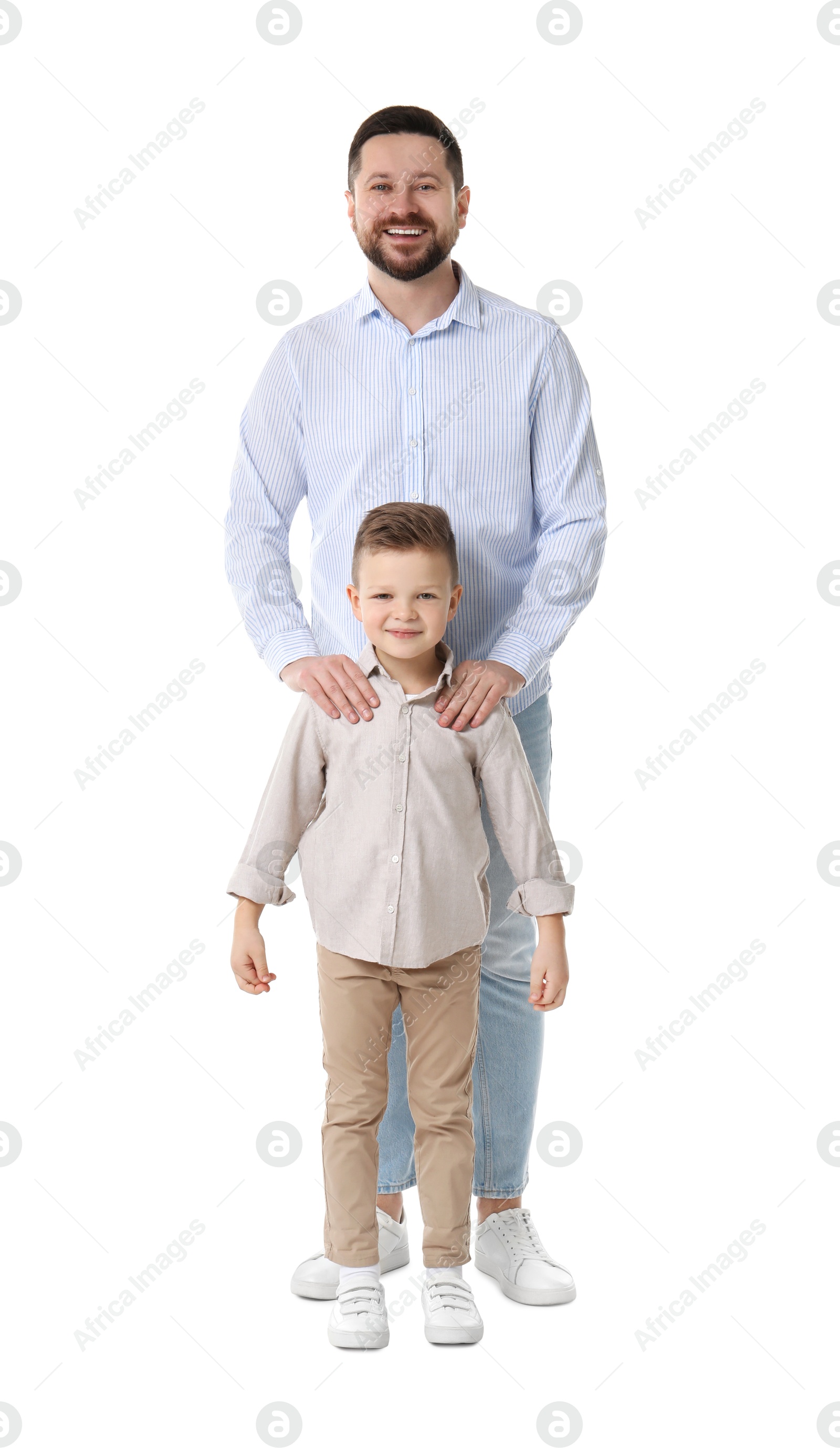 Photo of Happy father with his cute little son on white background