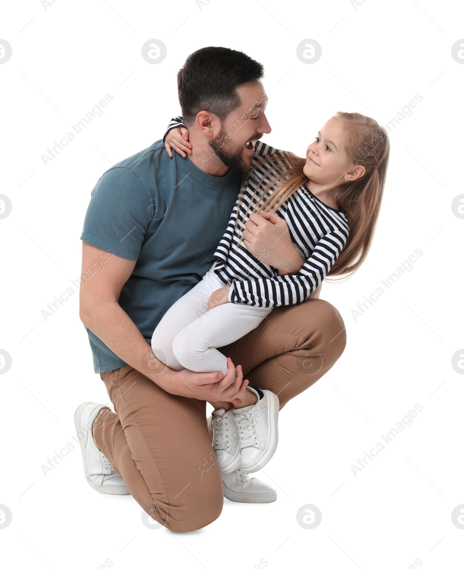 Photo of Happy father and his cute little daughter on white background