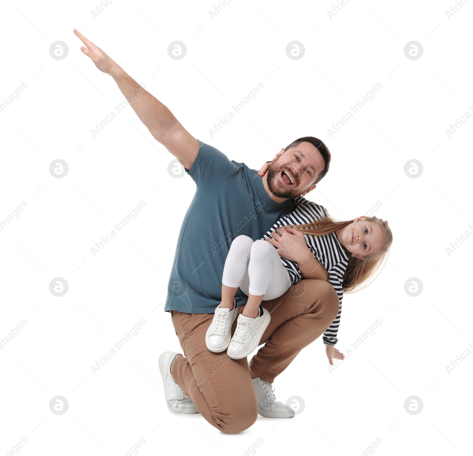 Photo of Happy father and his cute little daughter having fun on white background