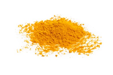 Photo of Heap of turmeric powder isolated on white