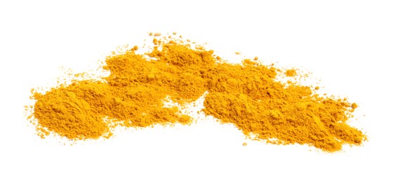 Photo of Heap of turmeric powder isolated on white