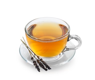 Aromatic lavender tea in glass cup and dry flowers isolated on white