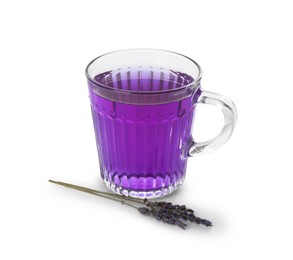 Aromatic lavender tea in glass cup and dry flowers isolated on white