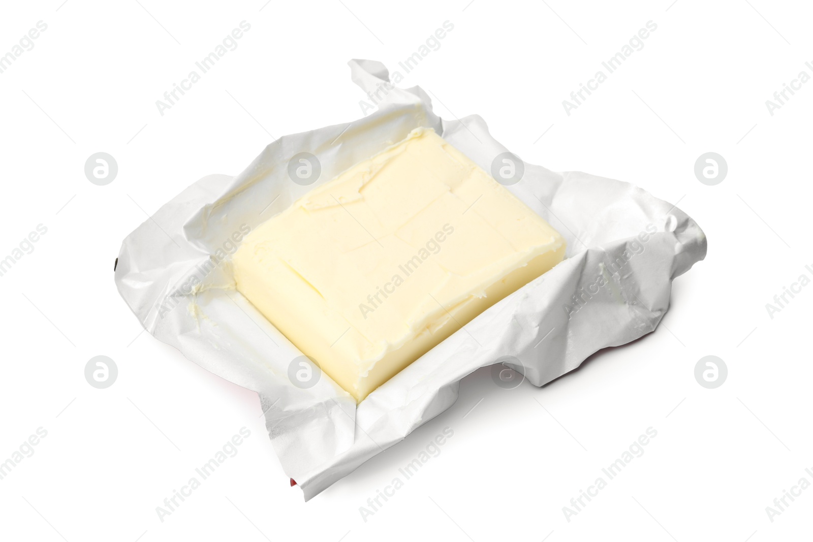 Photo of Block of tasty butter in open package isolated on white