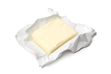 Photo of Block of tasty butter in open package isolated on white