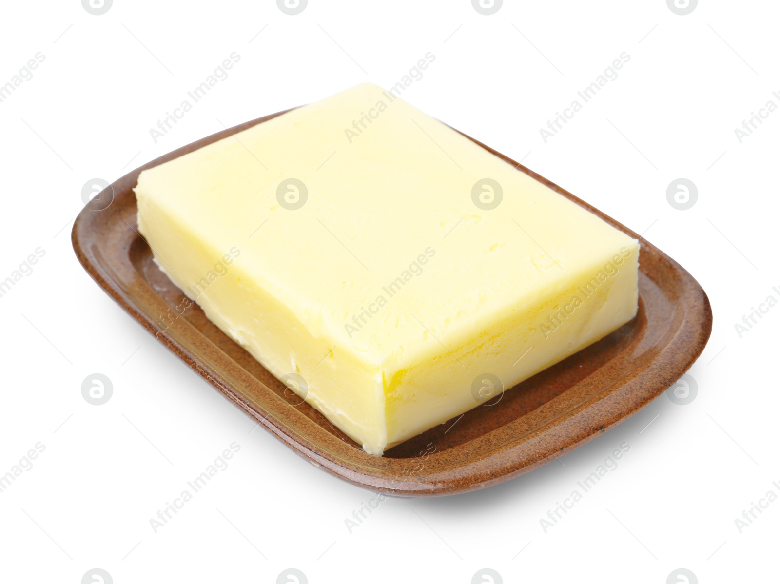 Photo of Block of tasty butter in dish isolated on white