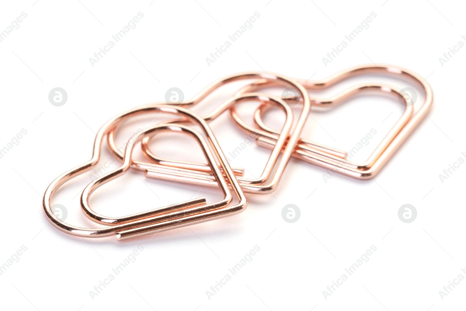 Photo of Heart shaped paper clips isolated on white