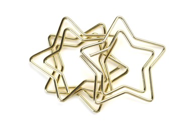 Photo of Star shaped paper clips isolated on white, top view