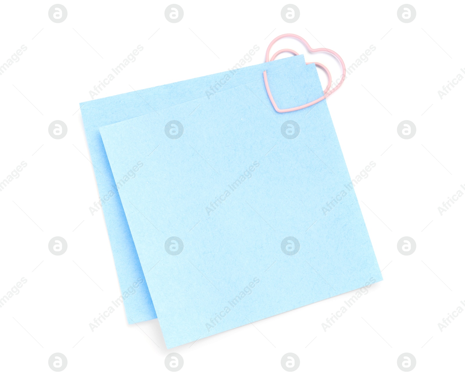 Photo of Blank paper notes attached with clip isolated on white, top view