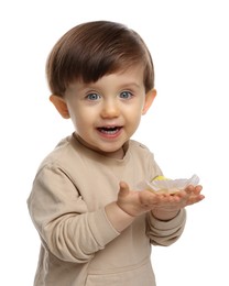 Photo of Cute little child with tasty mochi on white background